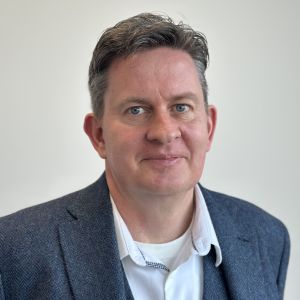 Tom Drury — Director, Core Compliance